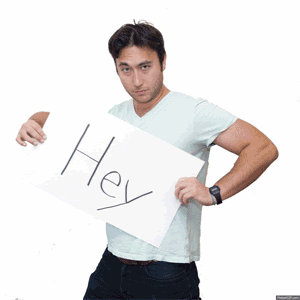 GIF of people holding papers with words
